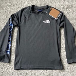 The North Face boys sun shirt. Brand new with tags. Size small/ Boys 7/8